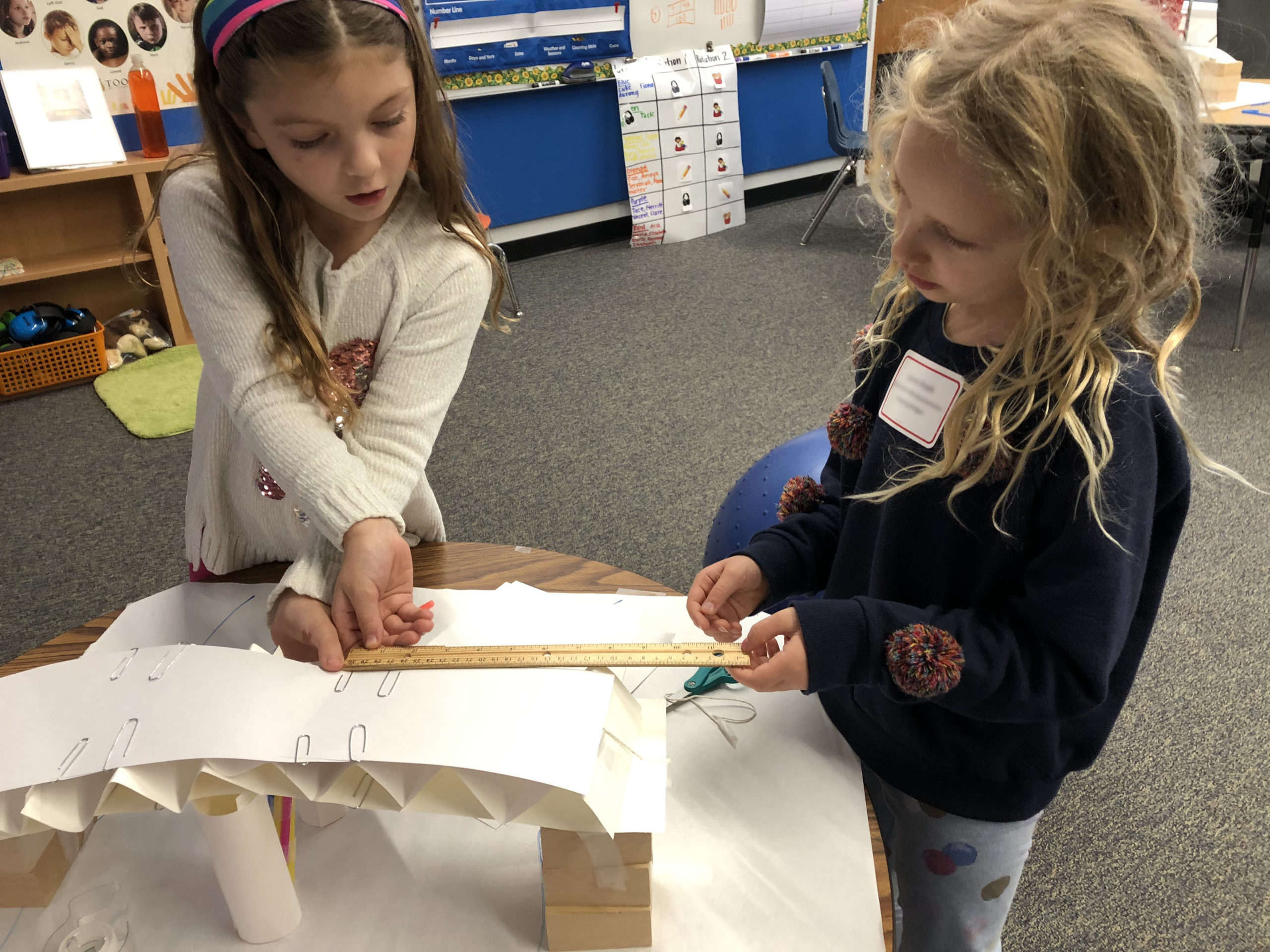 YESBridges YES students measuring with a ruler