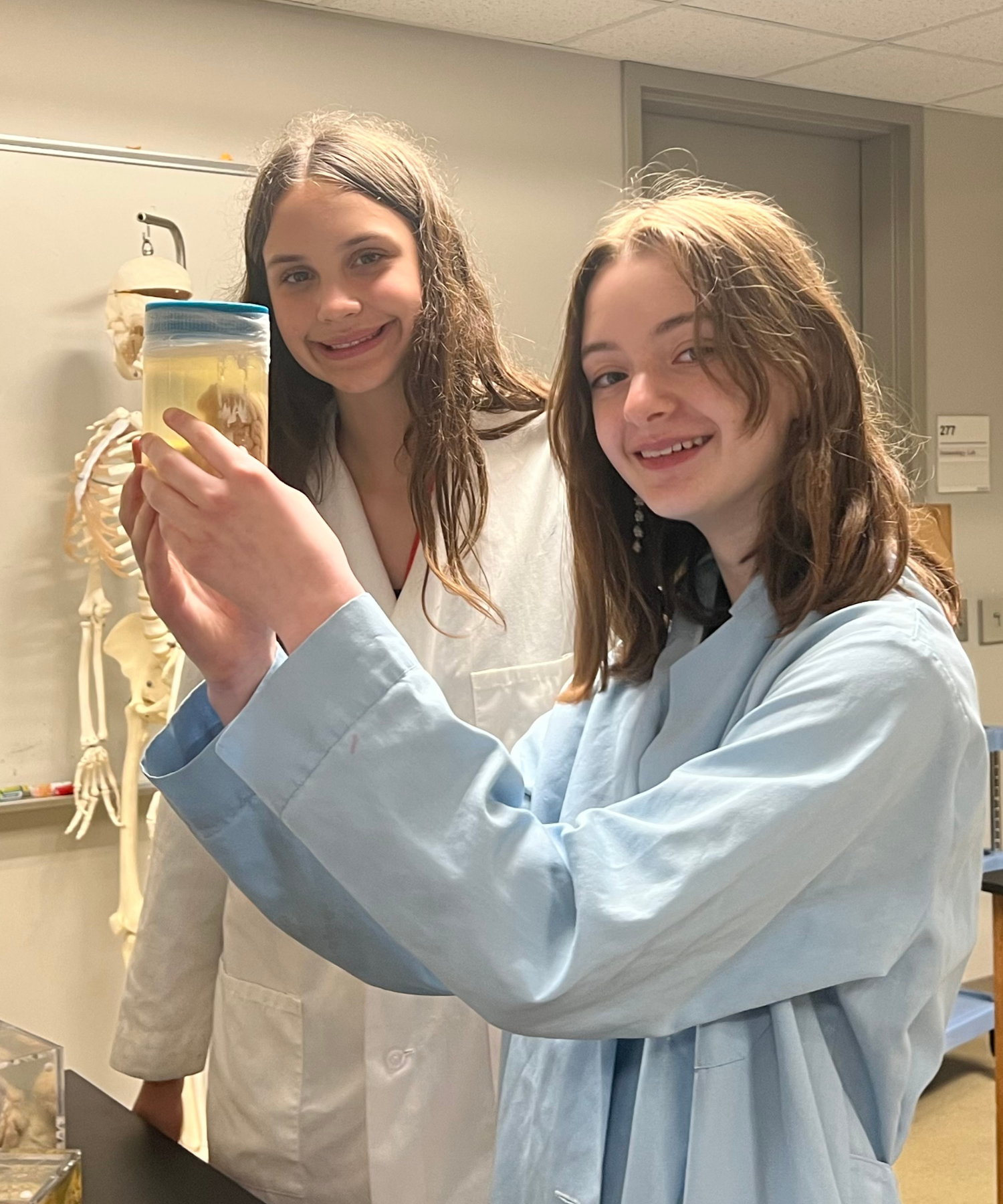 students examining brain EYM '25 students examining brain EYM '25